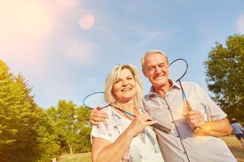 Picture of a couple with badminton rackets